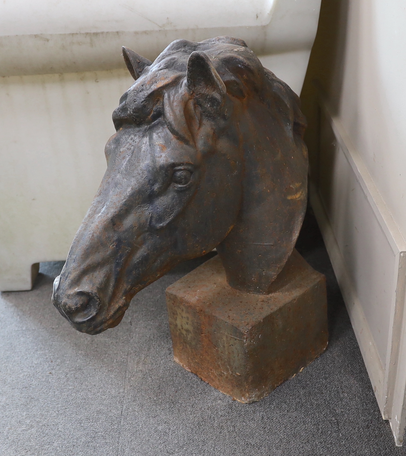 A pair of large cast iron horse head post finials, height 64cm